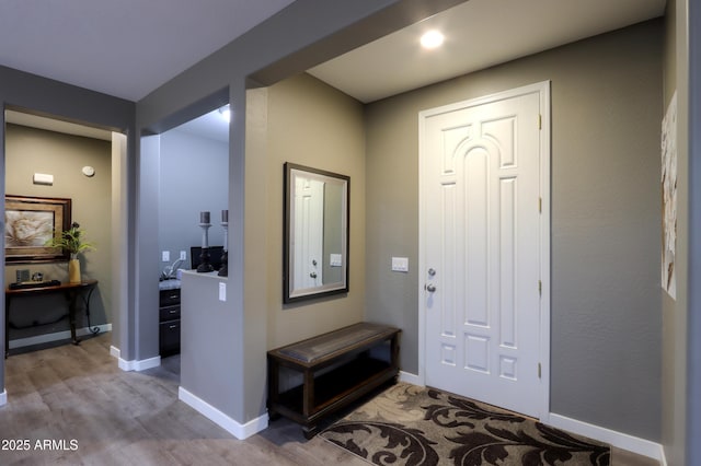 entrance foyer with light hardwood / wood-style flooring