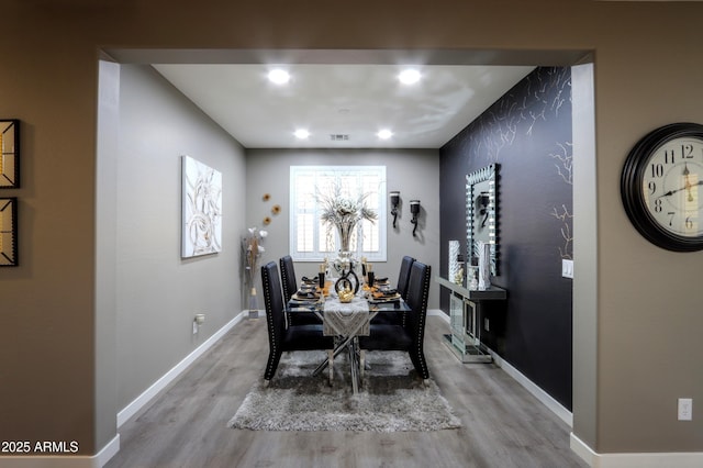 dining space featuring light hardwood / wood-style flooring