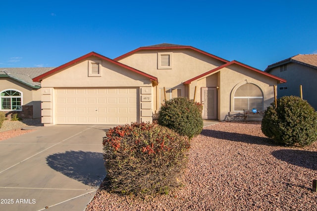 single story home with a garage