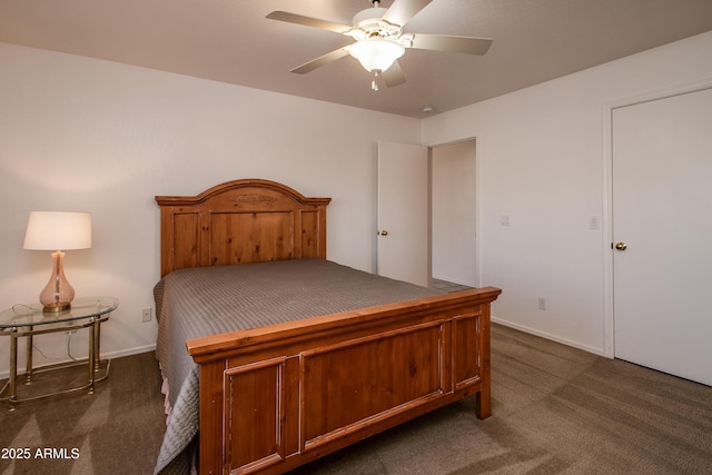 bedroom featuring dark colored carpet and ceiling fan