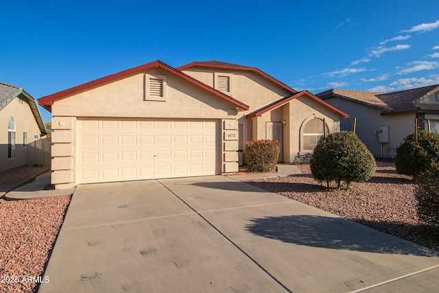 single story home featuring a garage