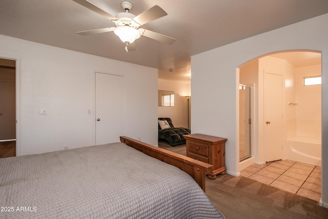 bedroom with ceiling fan and light colored carpet