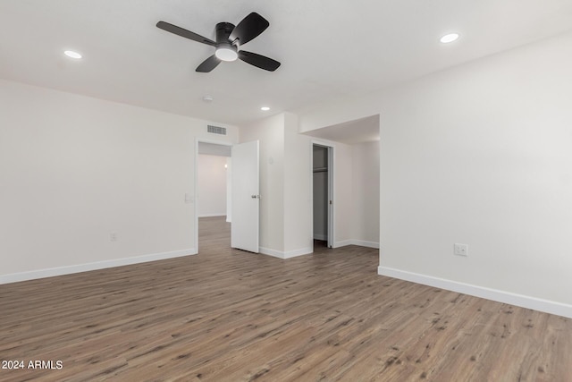 unfurnished bedroom featuring ceiling fan and wood-type flooring