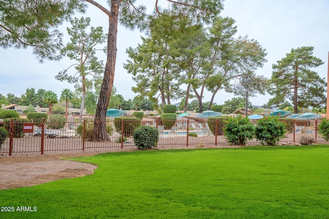 view of yard featuring a community pool