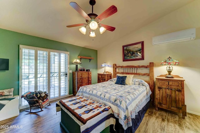 1704 S Barkley Rd, Apache Junction, AZ 85119 - bedroom featuring a wall unit AC, wood finished floors, lofted ceiling, access to outside, and ceiling fan