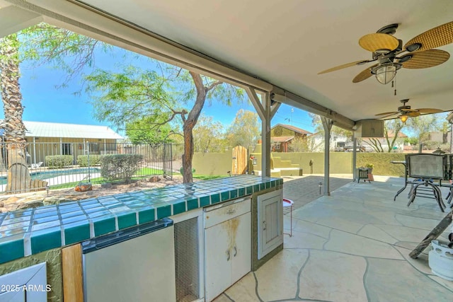 1704 S Barkley Rd, Apache Junction, AZ 85119 - view of patio featuring an outdoor kitchen and a ceiling fan