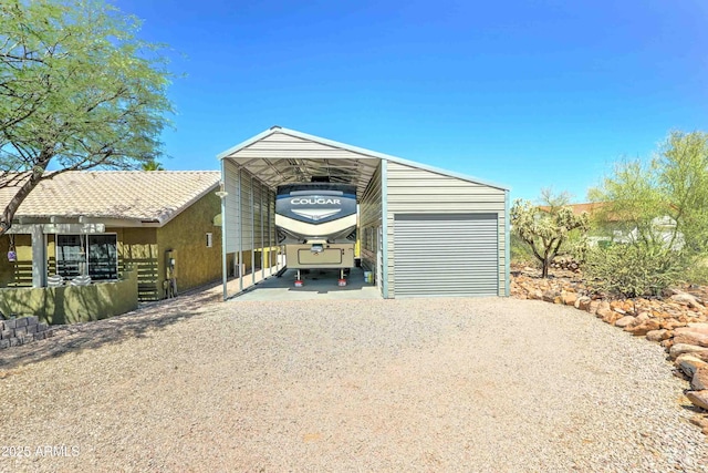1704 S Barkley Rd, Apache Junction, AZ 85119 - garage with a detached carport and gravel driveway