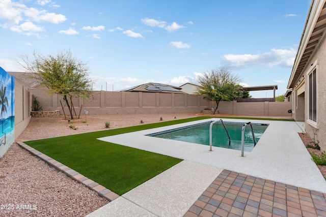 view of pool featuring a patio area, a fenced in pool, and a fenced backyard