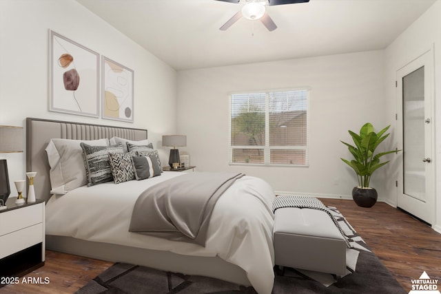 bedroom featuring a ceiling fan, baseboards, and dark wood-style flooring