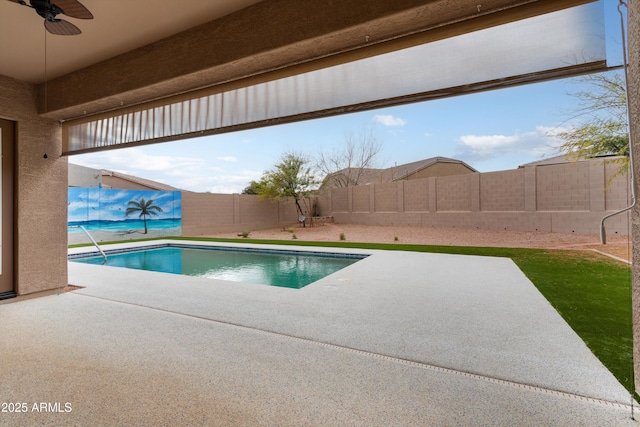 view of swimming pool featuring ceiling fan, a fenced in pool, a patio, and a fenced backyard