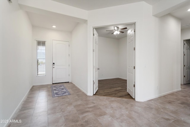 entrance foyer with recessed lighting, baseboards, and ceiling fan