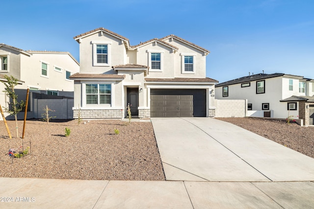 view of front of home featuring a garage