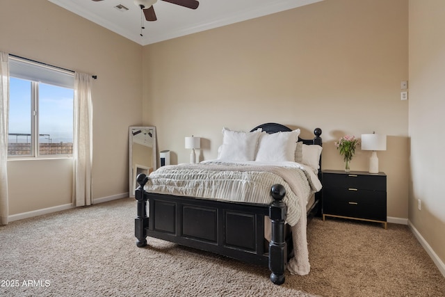 carpeted bedroom featuring ceiling fan and ornamental molding