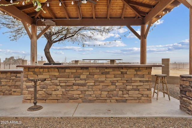 exterior space featuring ceiling fan