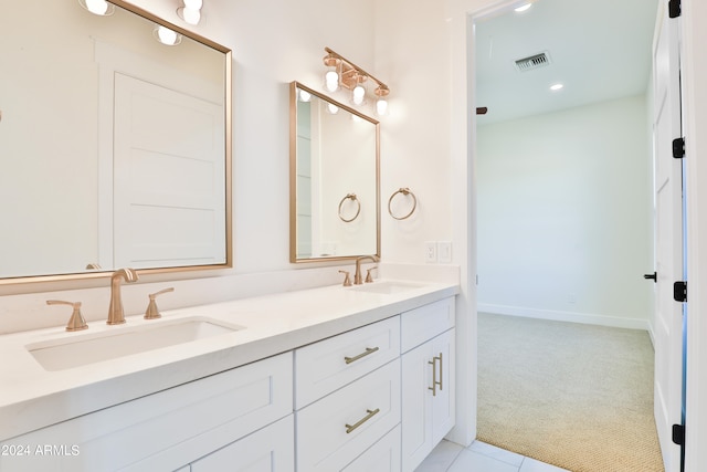 bathroom featuring vanity and tile patterned flooring