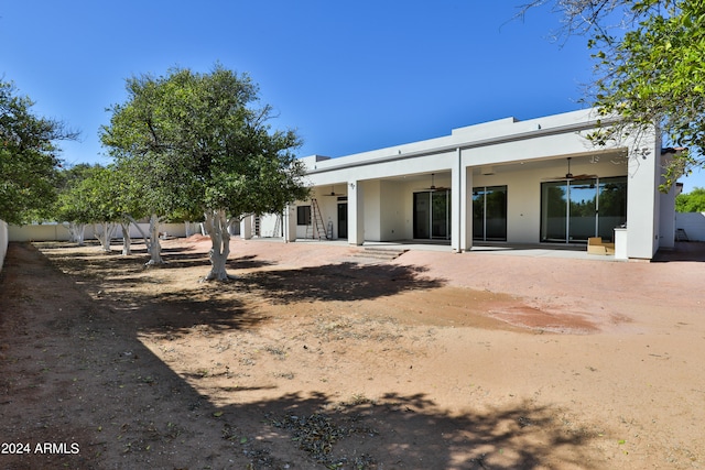 back of house featuring a patio area