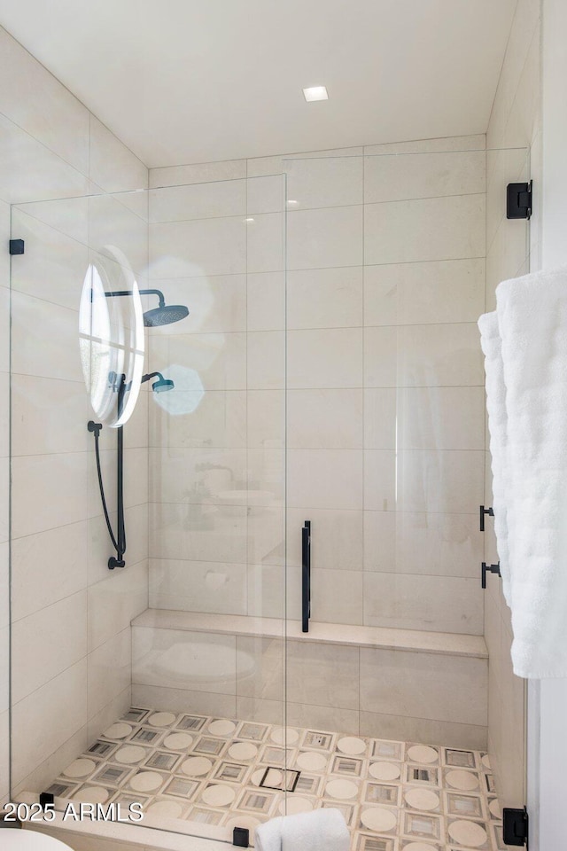 bathroom with an enclosed shower