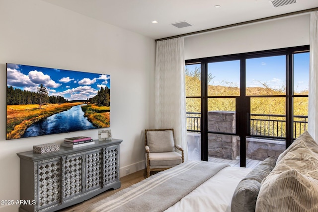 bedroom featuring hardwood / wood-style flooring