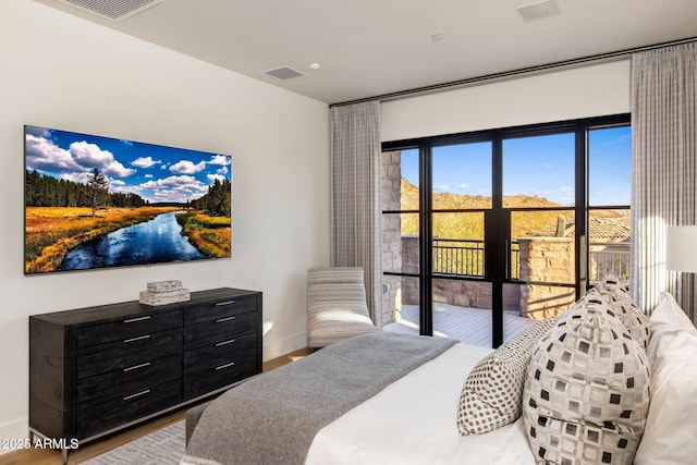 bedroom featuring light hardwood / wood-style floors