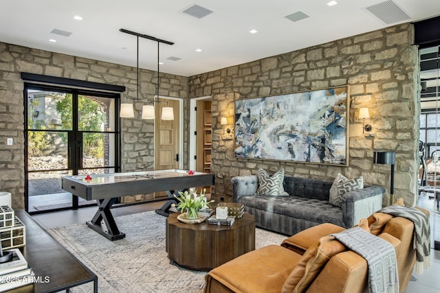 playroom featuring tile patterned floors and a healthy amount of sunlight