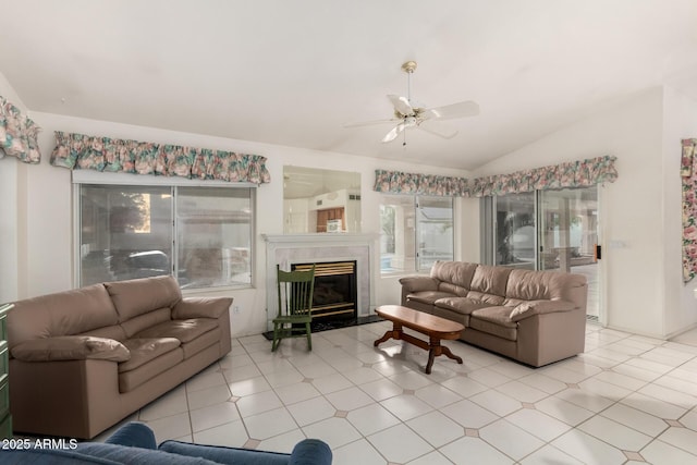462 N Bedford Ct, Chandler, AZ 85225 - living room with vaulted ceiling, a ceiling fan, and a tile fireplace