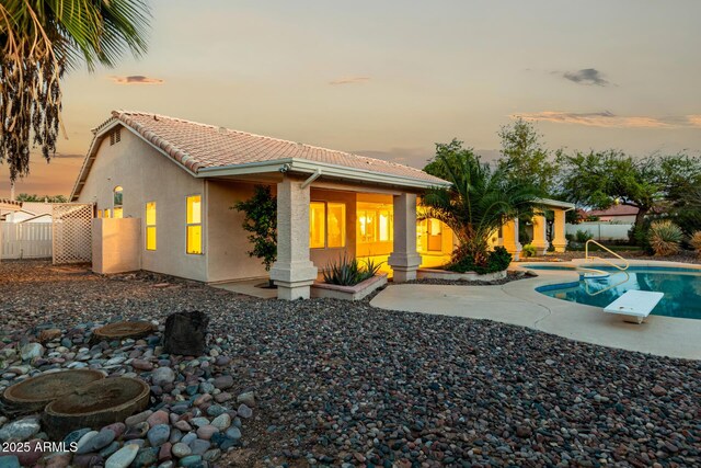 462 N Bedford Ct, Chandler, AZ 85225 - rear view of property featuring a tiled roof, stucco siding, and a patio area
