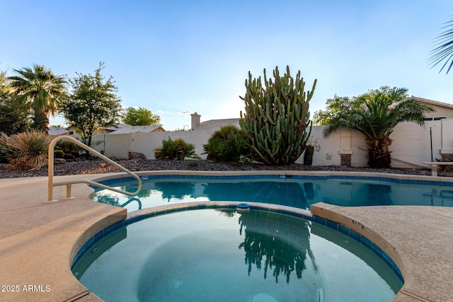 462 N Bedford Ct, Chandler, AZ 85225 - view of pool featuring a pool with connected hot tub and a fenced backyard