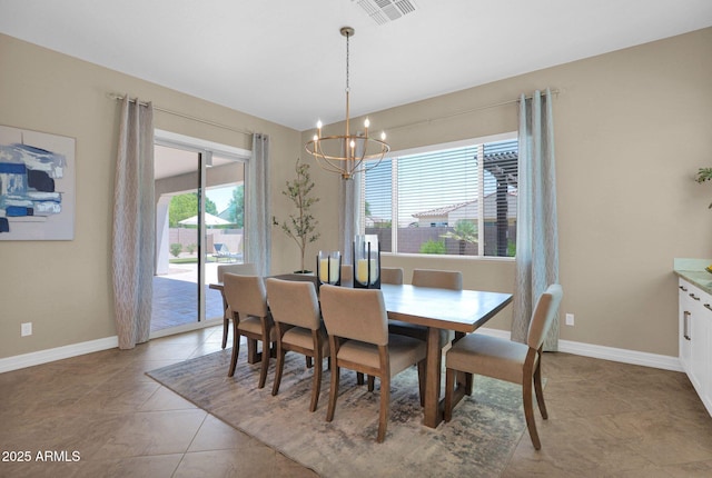 20151 E Via Del Palo St, Queen Creek, AZ 85142 - dining room featuring a chandelier and light tile patterned flooring