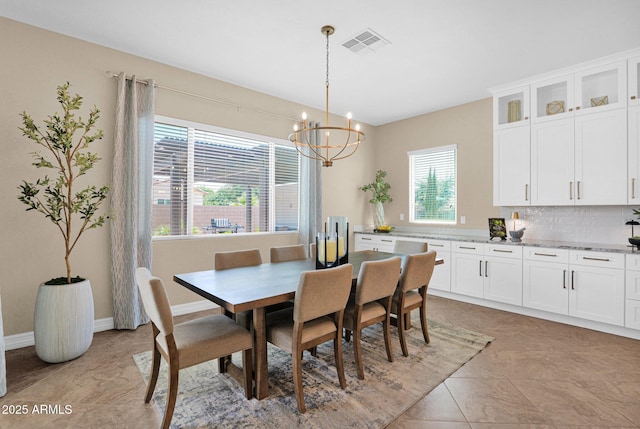 20151 E Via Del Palo St, Queen Creek, AZ 85142 - dining area featuring a chandelier