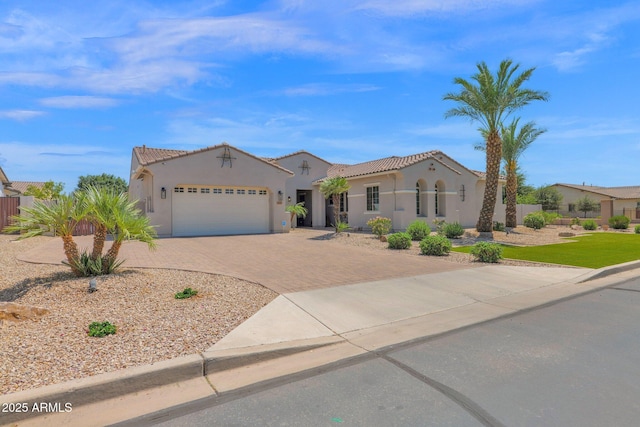 20151 E Via Del Palo St, Queen Creek, AZ 85142 - mediterranean / spanish-style home with decorative driveway, a garage, stucco siding, and a tiled roof