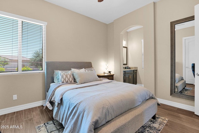 20151 E Via Del Palo St, Queen Creek, AZ 85142 - bedroom featuring arched walkways, wood finished floors, and ensuite bathroom