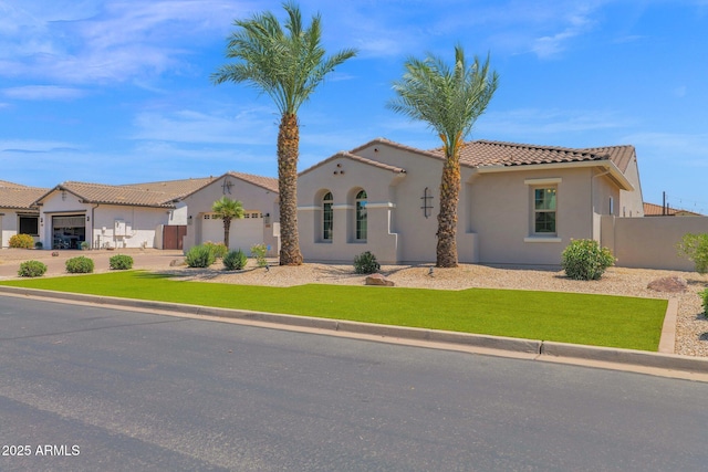 20151 E Via Del Palo St, Queen Creek, AZ 85142 - mediterranean / spanish-style home featuring a tiled roof, an attached garage, stucco siding, and concrete driveway