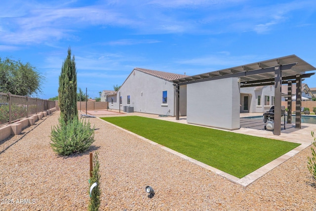 20151 E Via Del Palo St, Queen Creek, AZ 85142 - back of house with stucco siding, a patio area, a fenced backyard, and a swimming pool