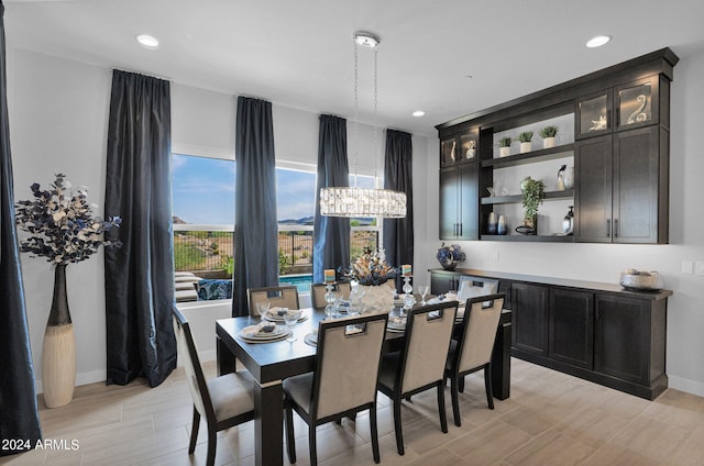 dining room featuring a chandelier