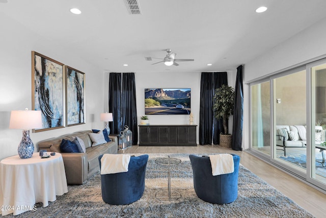 interior space featuring ceiling fan and hardwood / wood-style floors