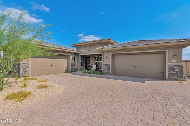 prairie-style home with a garage