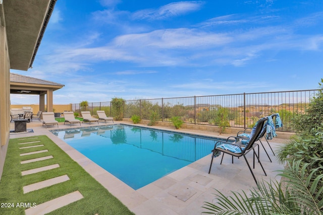 view of pool with a patio area