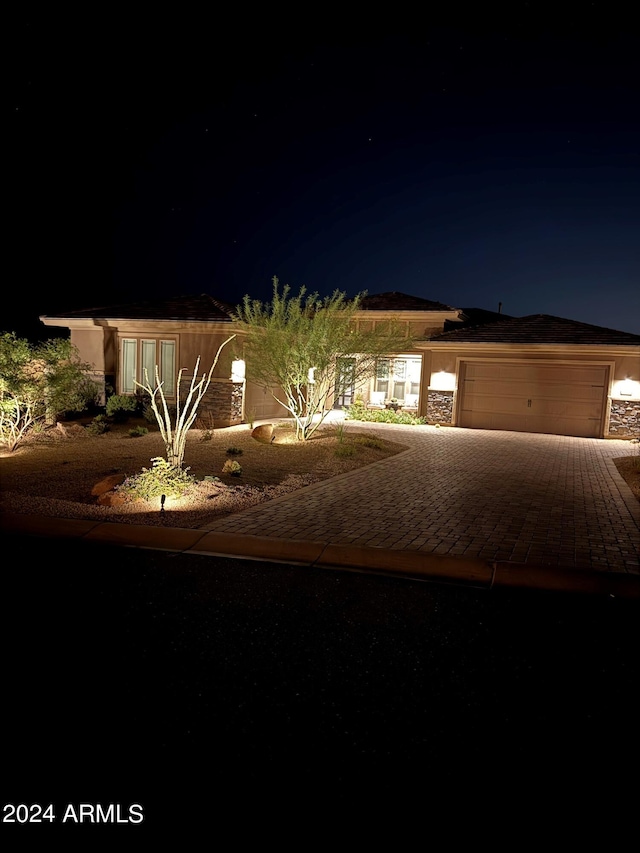 view of front of home with a garage