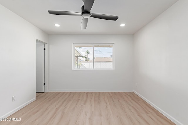empty room with light wood-type flooring, ceiling fan, baseboards, and recessed lighting