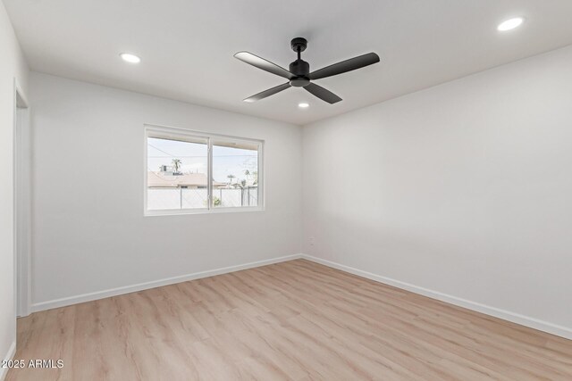 unfurnished room with a ceiling fan, recessed lighting, light wood finished floors, and baseboards