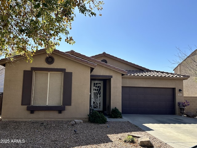 view of front of property with a garage