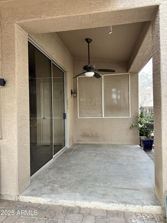 view of patio / terrace with ceiling fan