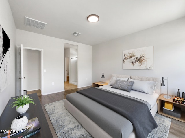 bedroom featuring hardwood / wood-style floors