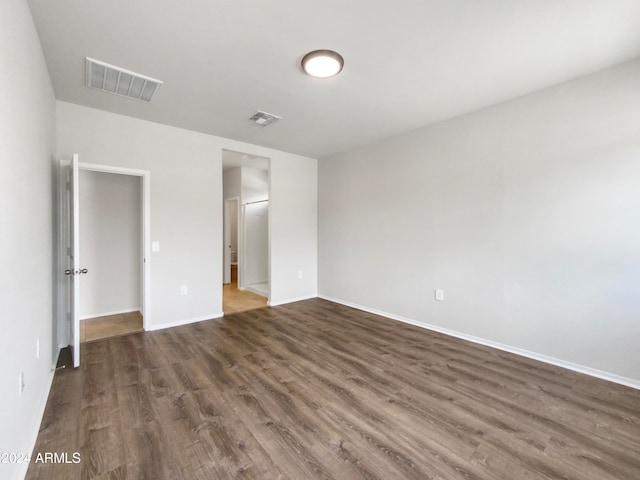 unfurnished bedroom featuring wood-type flooring