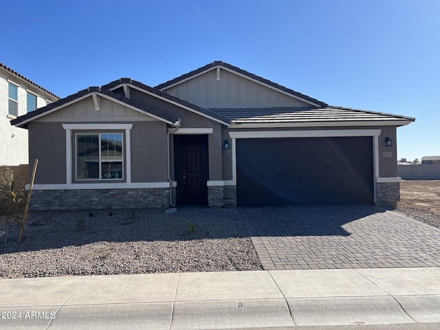 view of front of property featuring a garage