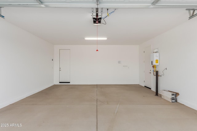 garage featuring water heater and a garage door opener