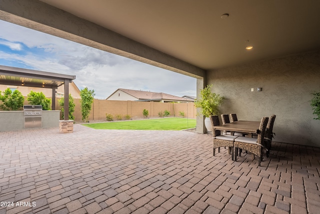 view of patio with a grill and exterior kitchen