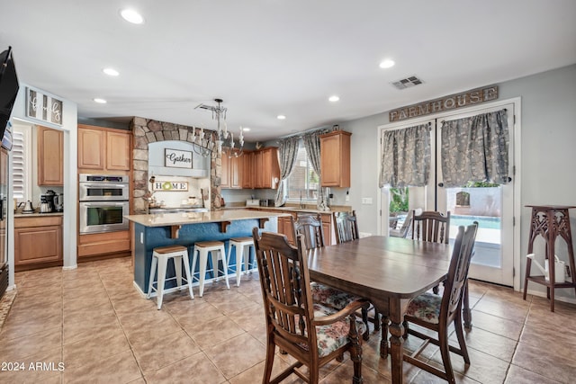 dining room featuring light tile patterned floors, recessed lighting, and visible vents