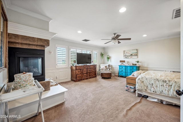 carpeted bedroom featuring recessed lighting, visible vents, ornamental molding, and a decorative wall