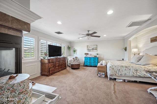 carpeted bedroom with visible vents, ornamental molding, and recessed lighting